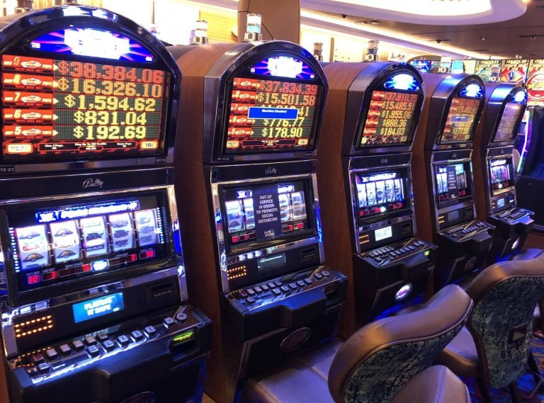 Mobile phone showing bm55 slot game interface in the Philippines